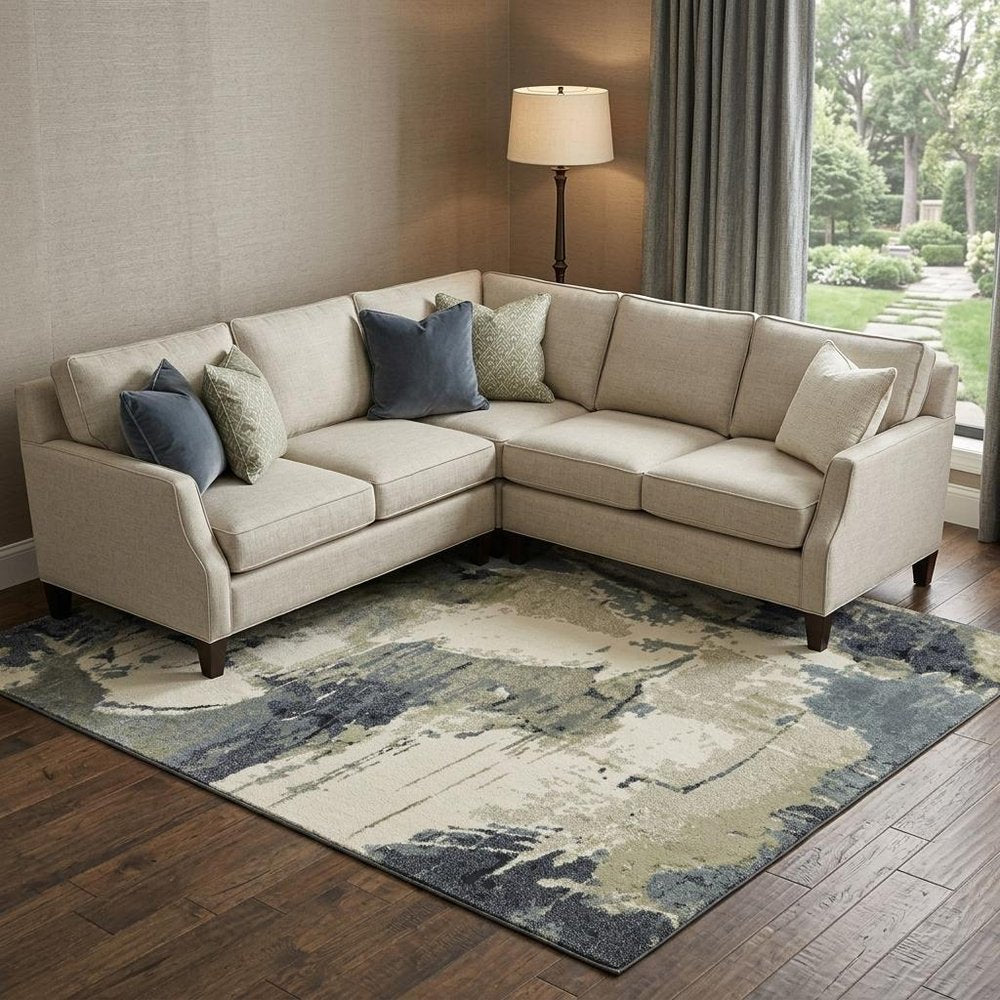 10' X 13' Blue Green And Ivory Abstract Area Rug