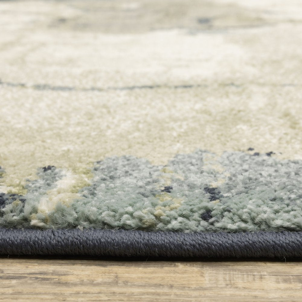 10' X 13' Blue Green And Ivory Abstract Area Rug