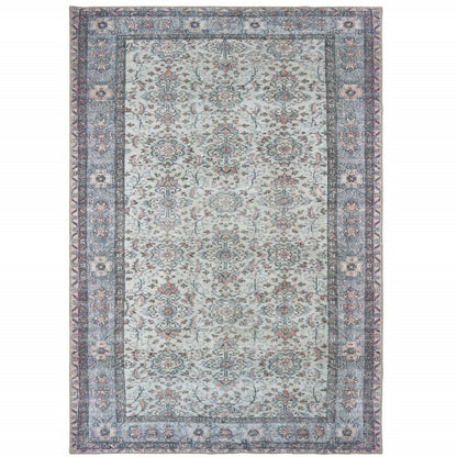 5' X 8' Ivory And Blue Oriental Power Loom Stain Resistant Area Rug
