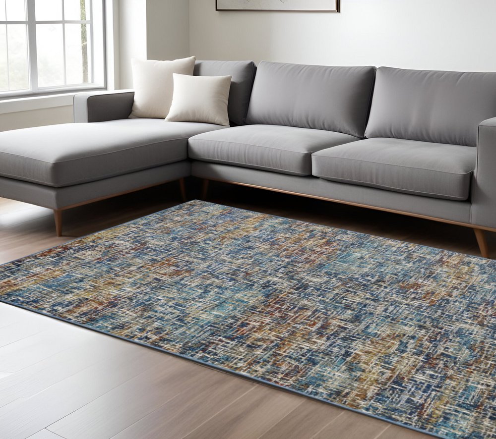 7' X 9' Blue And Beige Abstract Area Rug