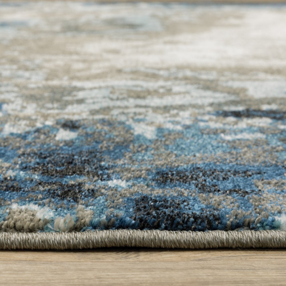 8' X 10' Blue And Beige Abstract Area Rug