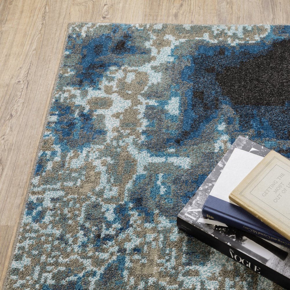 8' X 10' Blue And Beige Abstract Area Rug