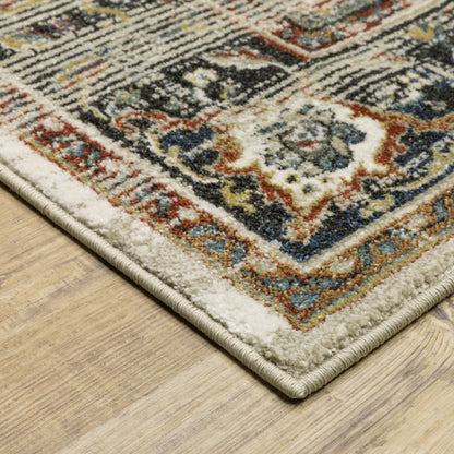 6' X 9' Beige Blue Green Rust And Grey Oriental Power Loom Stain Resistant Area Rug