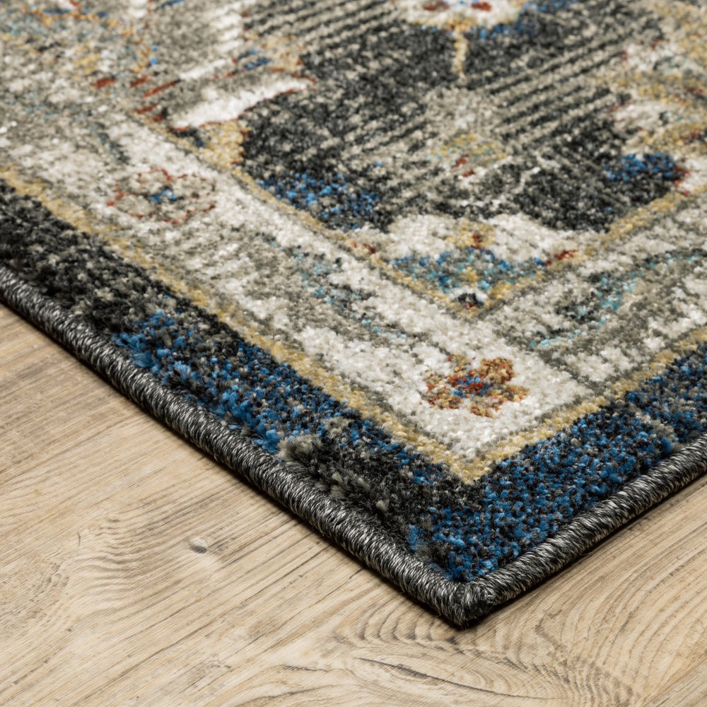 7' X 9' Charcoal And Blue Oriental Distressed Area Rug