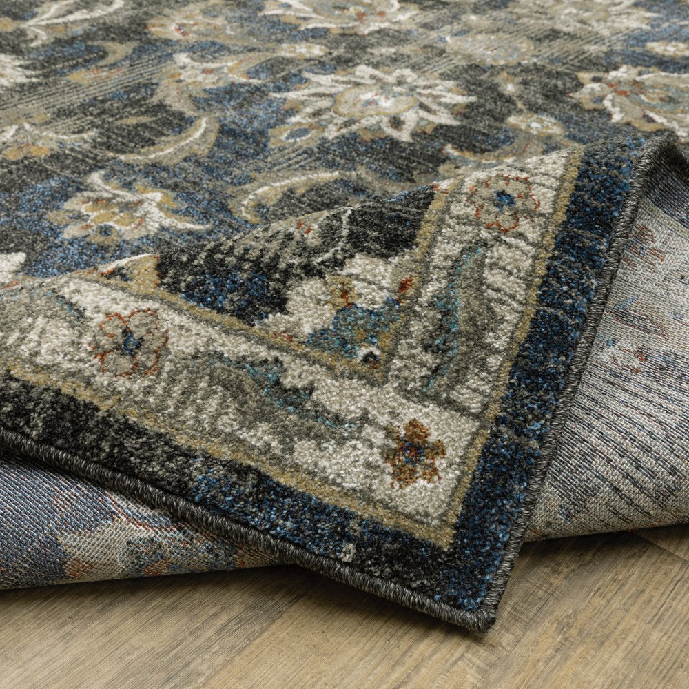 7' X 9' Charcoal And Blue Oriental Distressed Area Rug