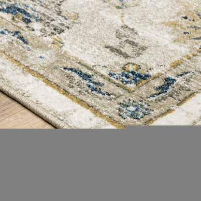 5' X 7' Beige Gold Blue And Grey Oriental Power Loom Stain Resistant Area Rug