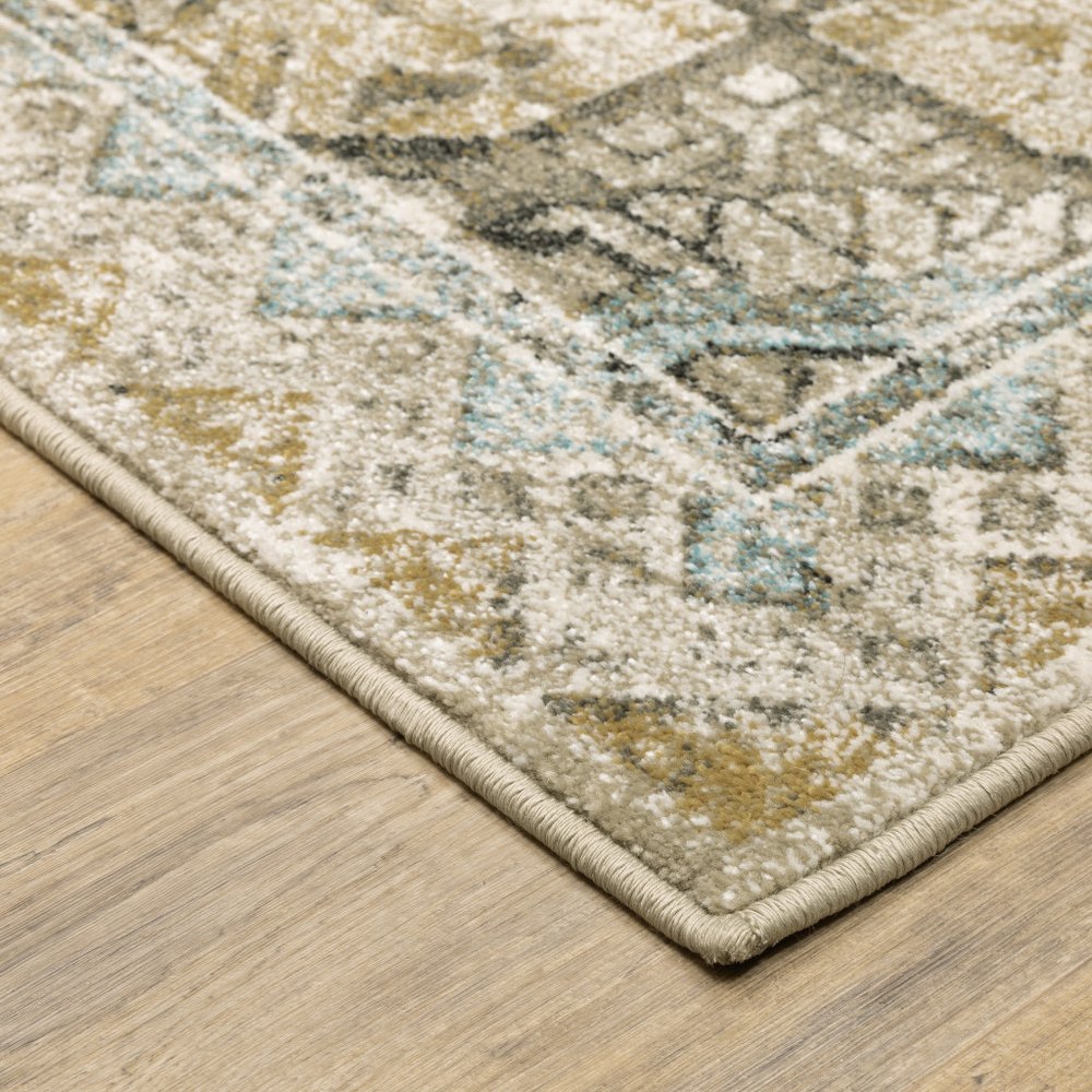 10' X 13' Grey Blue Beige And Gold Oriental Power Loom Stain Resistant Area Rug