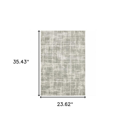 2' X 3' Grey And Ivory Abstract Shag Power Loom Stain Resistant Area Rug