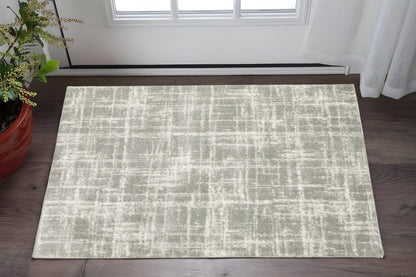 2' X 3' Grey And Ivory Abstract Shag Power Loom Stain Resistant Area Rug
