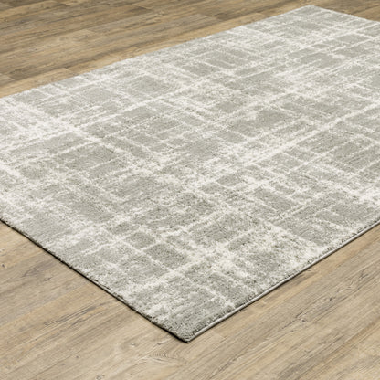 2' X 3' Grey And Ivory Abstract Shag Power Loom Stain Resistant Area Rug