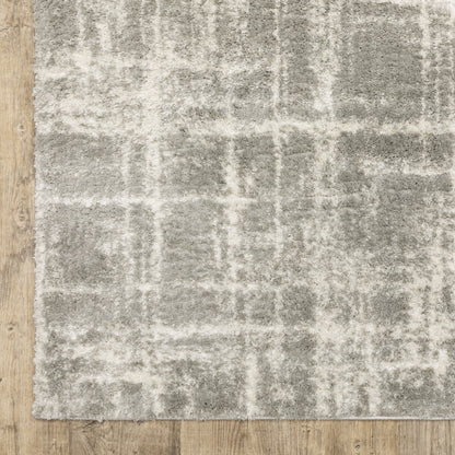 2' X 3' Grey And Ivory Abstract Shag Power Loom Stain Resistant Area Rug