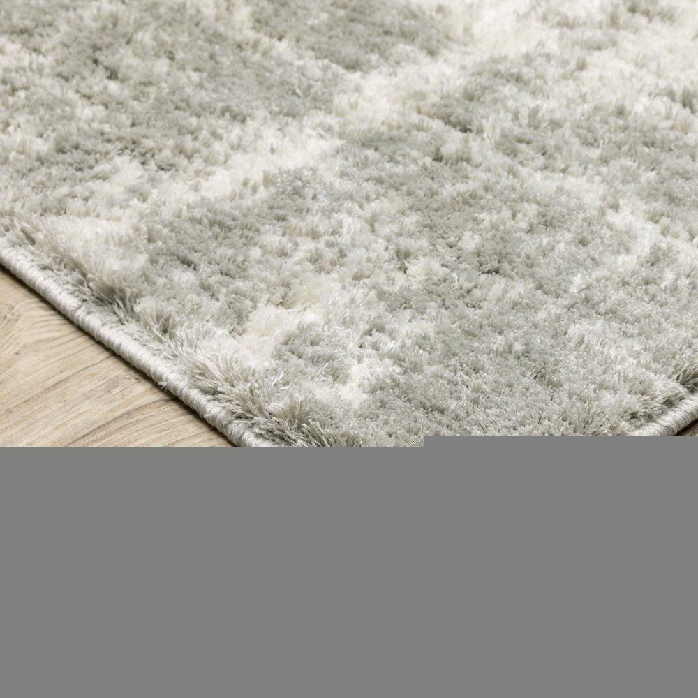 5' X 8' Grey And Ivory Abstract Shag Power Loom Stain Resistant Area Rug