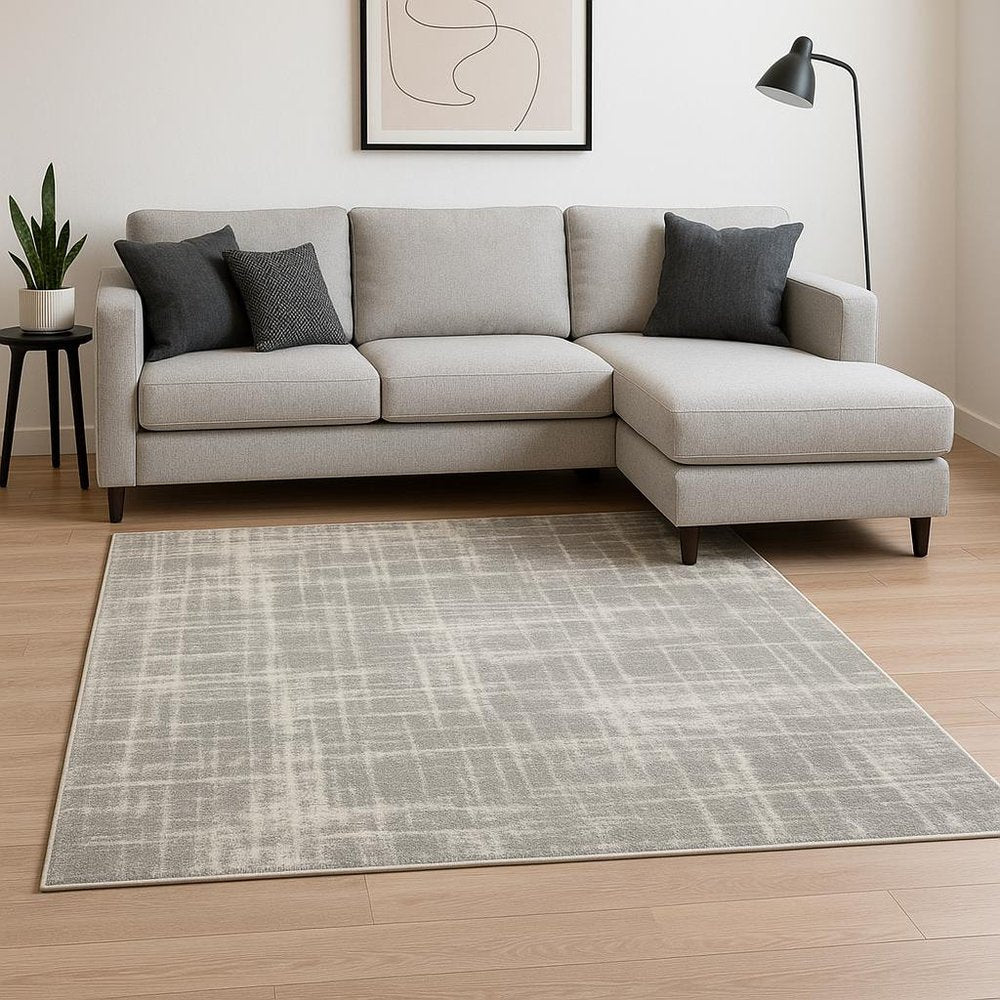 6' X 9' Grey And Ivory Abstract Shag Power Loom Stain Resistant Area Rug