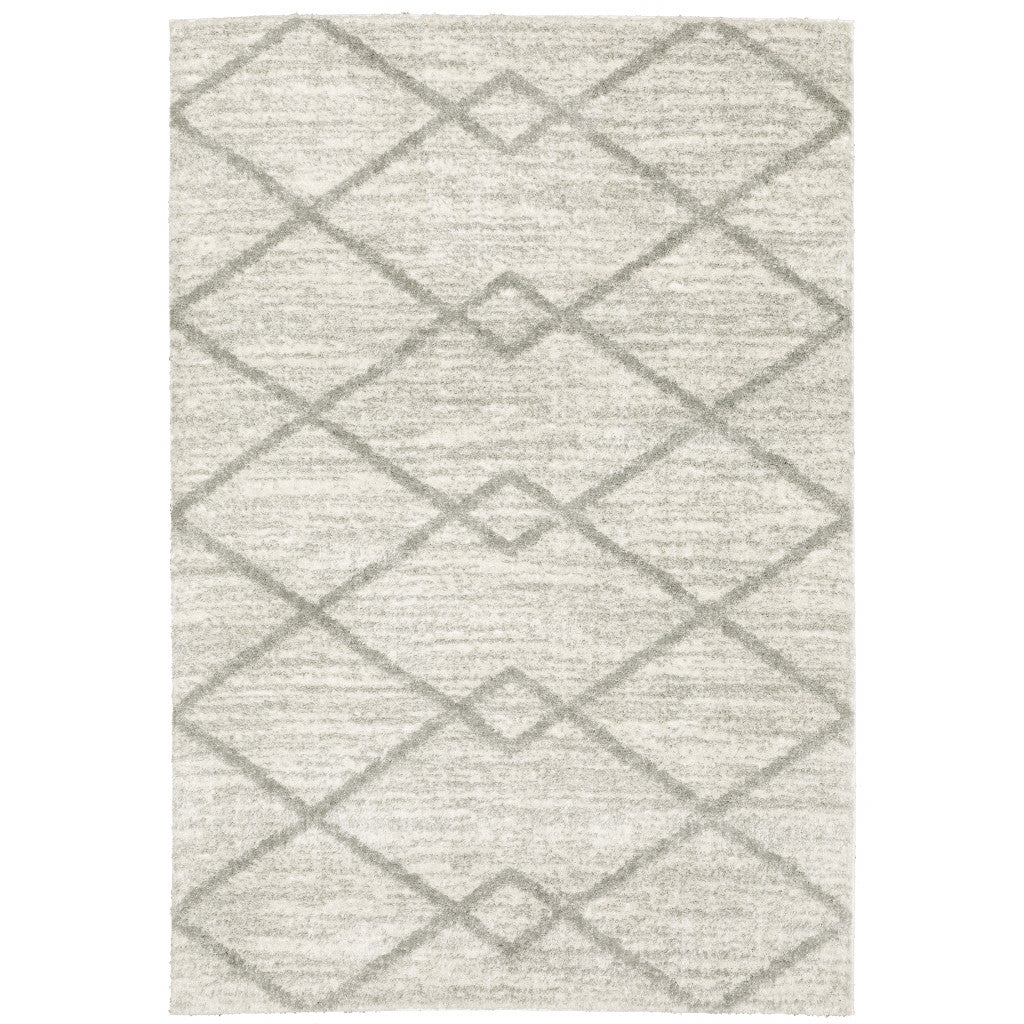 4' X 6' Ivory And Grey Geometric Shag Power Loom Stain Resistant Area Rug