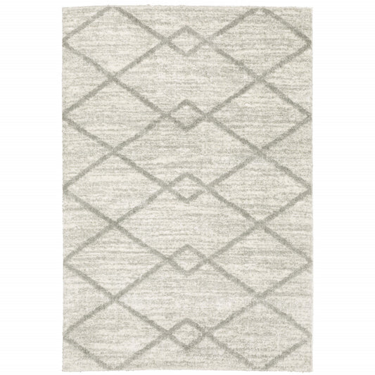 6' X 9' Ivory And Grey Geometric Shag Power Loom Stain Resistant Area Rug