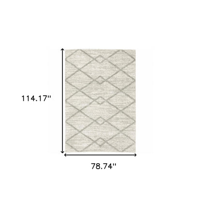 6' X 9' Ivory And Grey Geometric Shag Power Loom Stain Resistant Area Rug