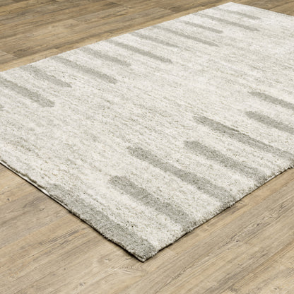 2' X 3' Ivory And Grey Geometric Shag Power Loom Stain Resistant Area Rug