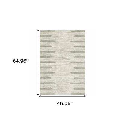 4' X 6' Ivory And Grey Geometric Shag Power Loom Stain Resistant Area Rug