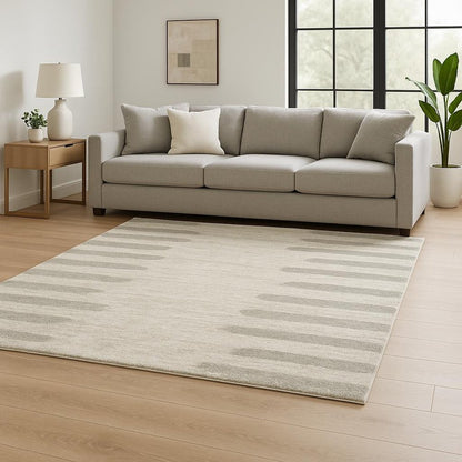 6' X 9' Ivory And Grey Geometric Shag Power Loom Stain Resistant Area Rug