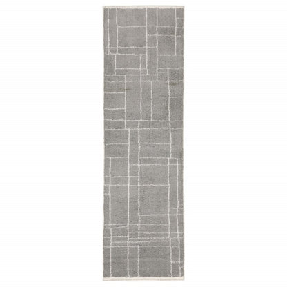 2' X 8' Grey And Ivory Geometric Shag Power Loom Stain Resistant Runner Rug