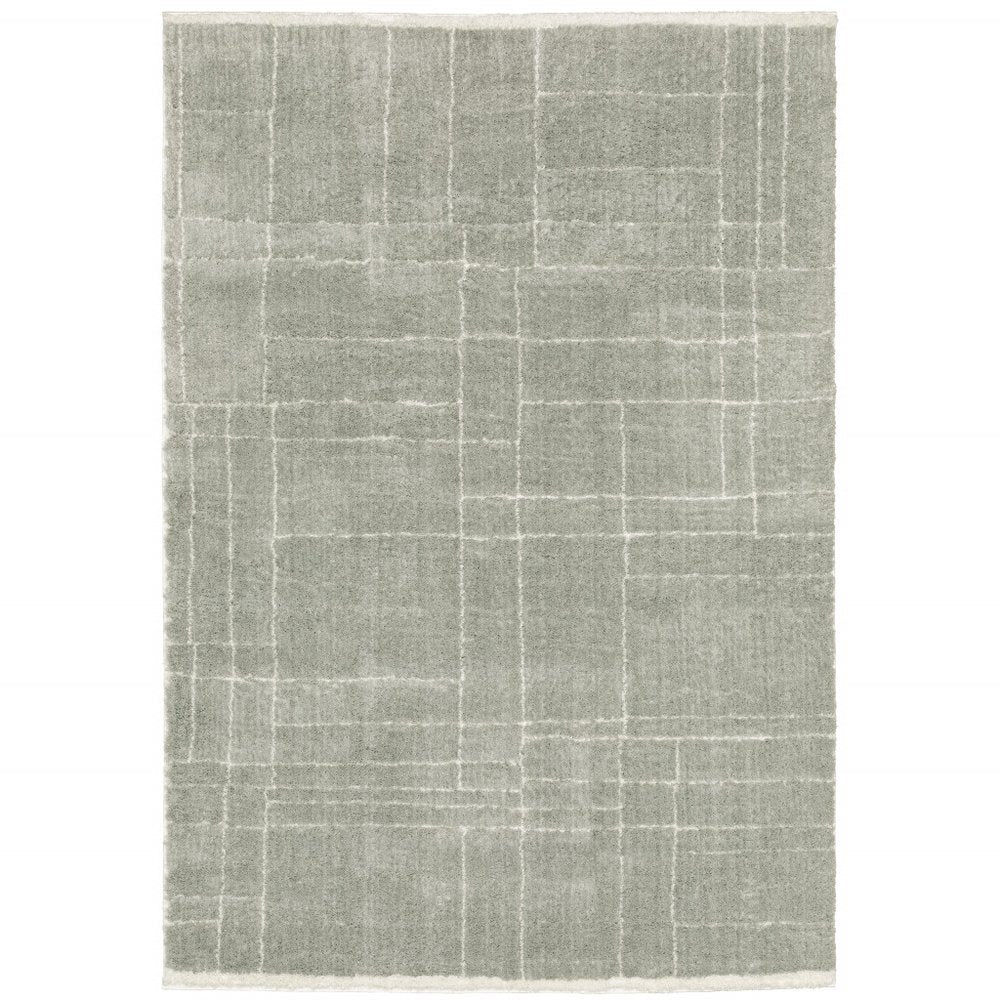 6' X 9' Grey And Ivory Geometric Shag Power Loom Stain Resistant Area Rug