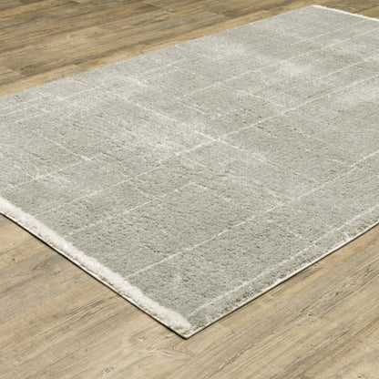 6' X 9' Grey And Ivory Geometric Shag Power Loom Stain Resistant Area Rug