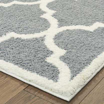 7' X 10' Gray And Ivory Geometric Shag Area Rug