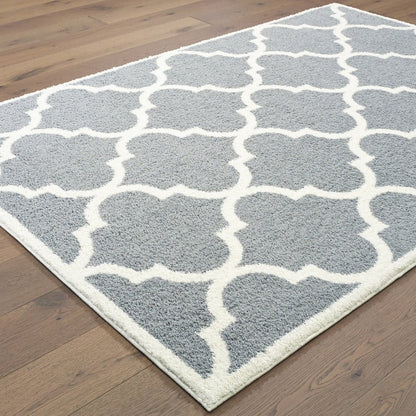 7' X 10' Gray And Ivory Geometric Shag Area Rug
