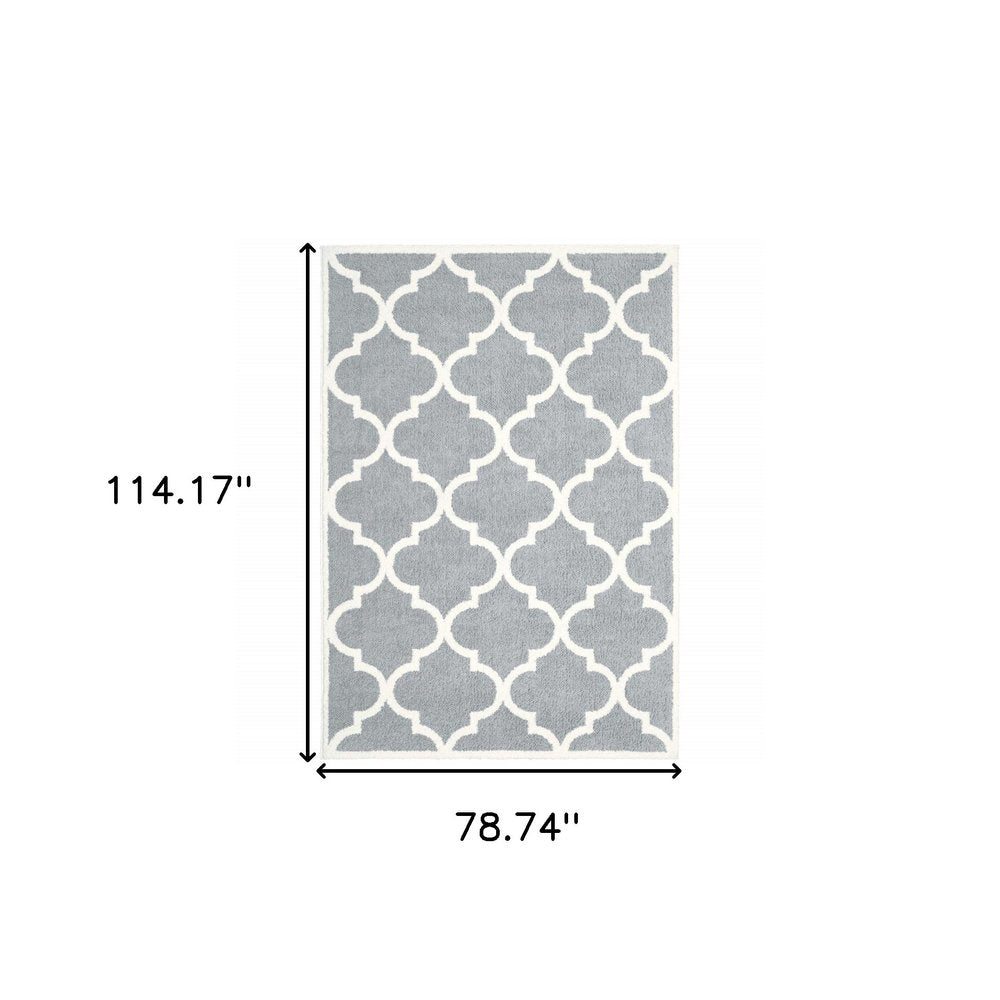 7' X 10' Gray And Ivory Geometric Shag Area Rug