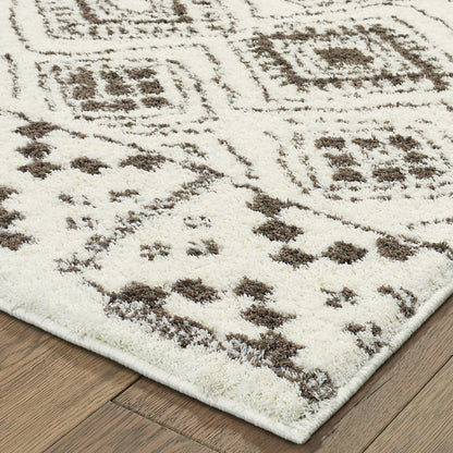 2' X 3' Ivory And Brown Geometric Shag Power Loom Stain Resistant Area Rug