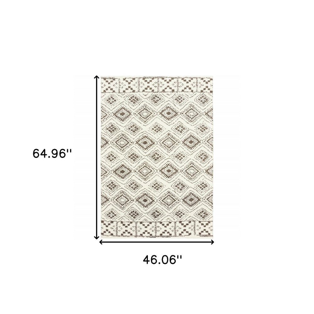 4' X 6' Ivory And Brown Geometric Shag Power Loom Stain Resistant Area Rug