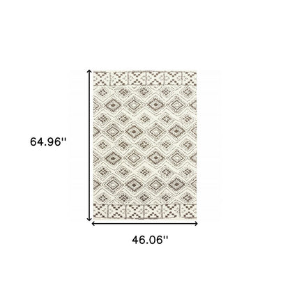 4' X 6' Ivory And Brown Geometric Shag Power Loom Stain Resistant Area Rug