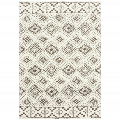 8' X 11' Ivory And Brown Geometric Shag Area Rug