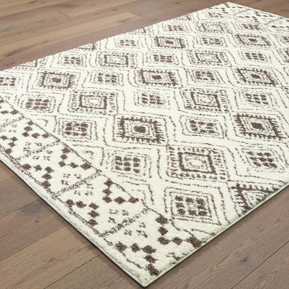 8' X 11' Ivory And Brown Geometric Shag Area Rug