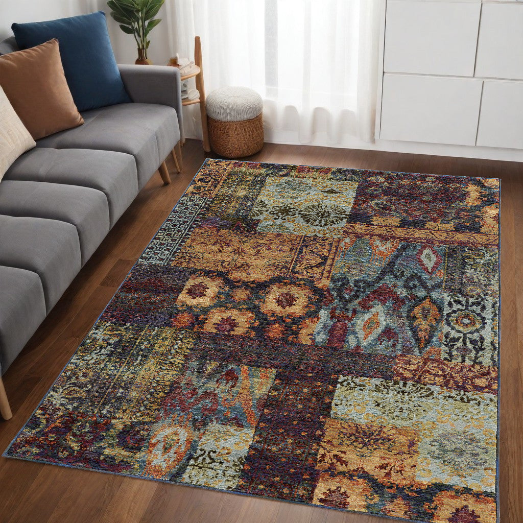 5' X 7' Blue and Gold Abstract Power Loom Area Rug