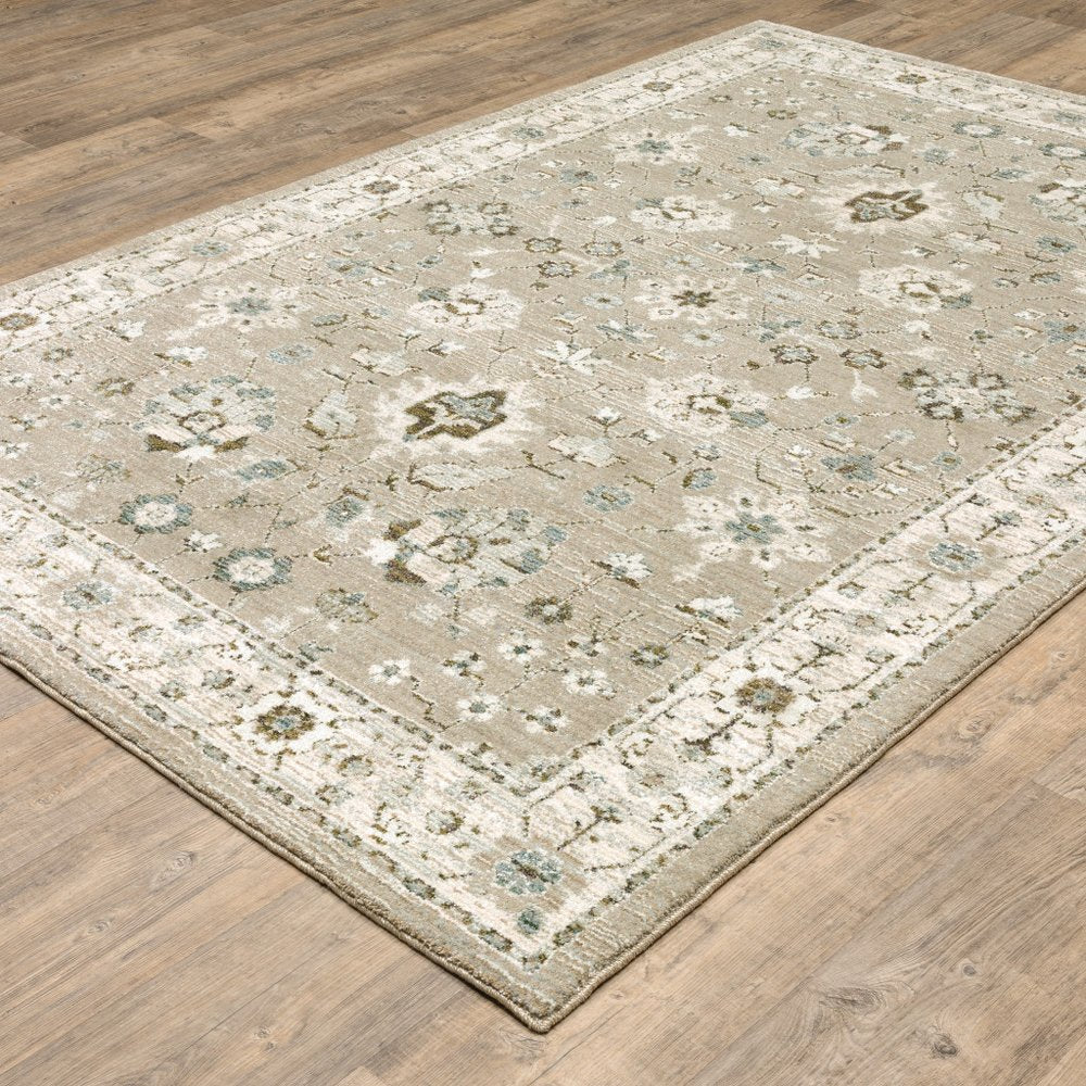 7' X 10' Beige and Ivory Oriental Power Loom Area Rug