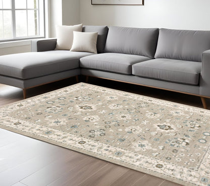 7' X 10' Beige and Ivory Oriental Power Loom Area Rug