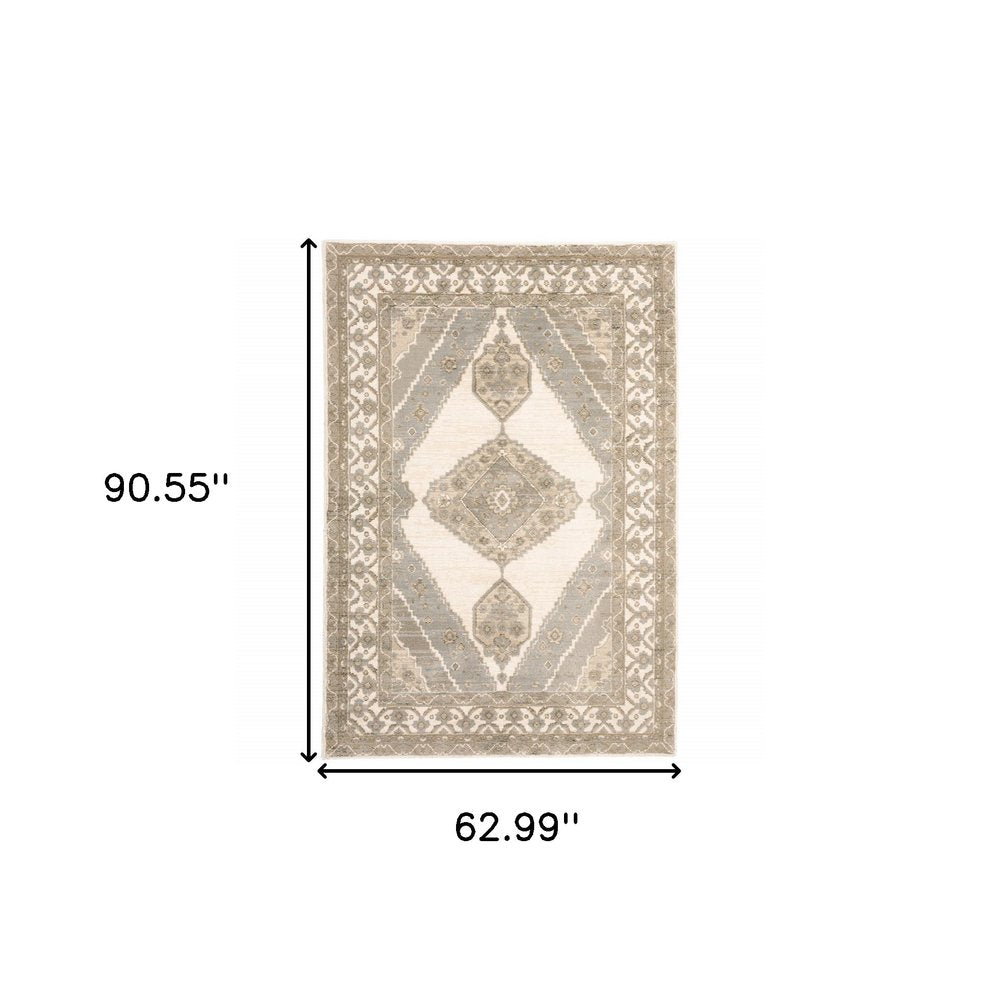 5' X 7' Beige And Ivory Oriental Area Rug