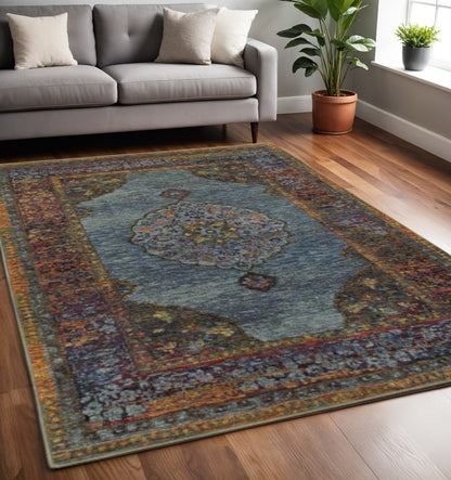 5' X 7' Blue and Beige Oriental Power Loom Area Rug