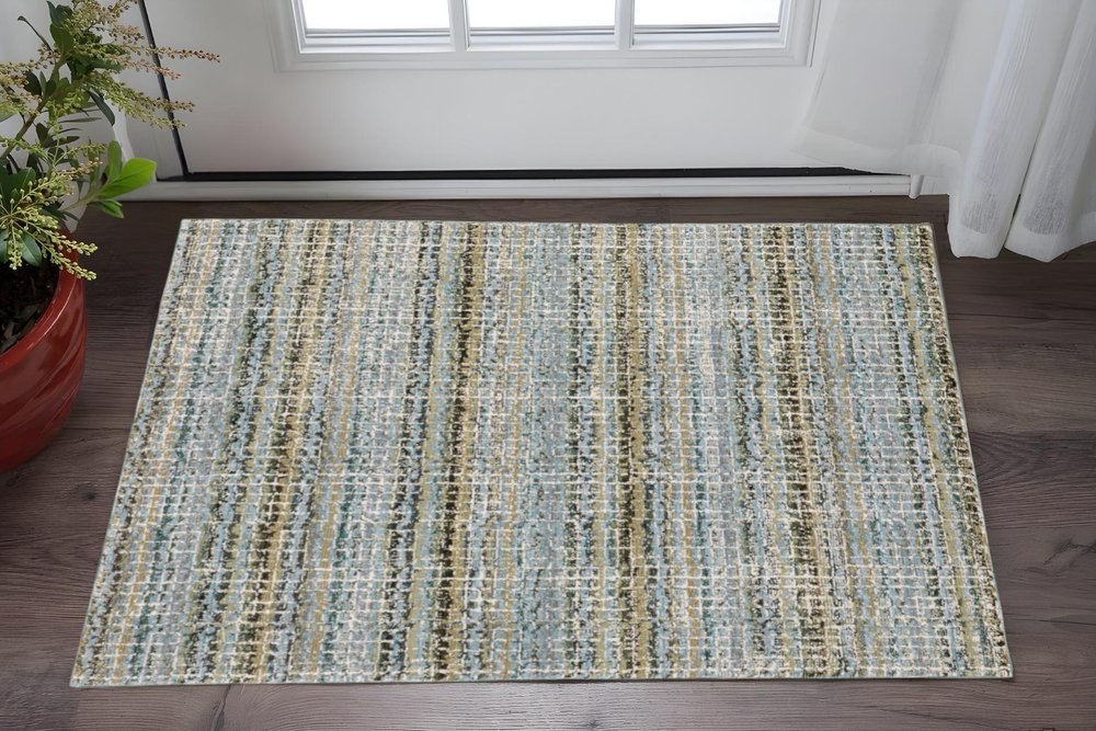 3' X 5' Blue and Ivory Abstract Power Loom Area Rug