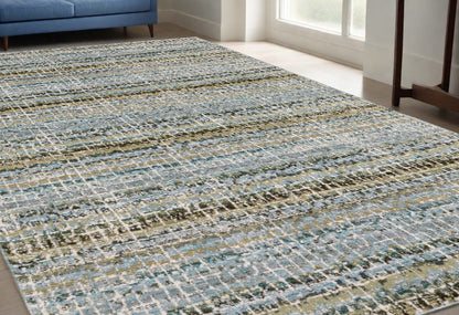 5' X 7' Blue and Ivory Abstract Power Loom Area Rug