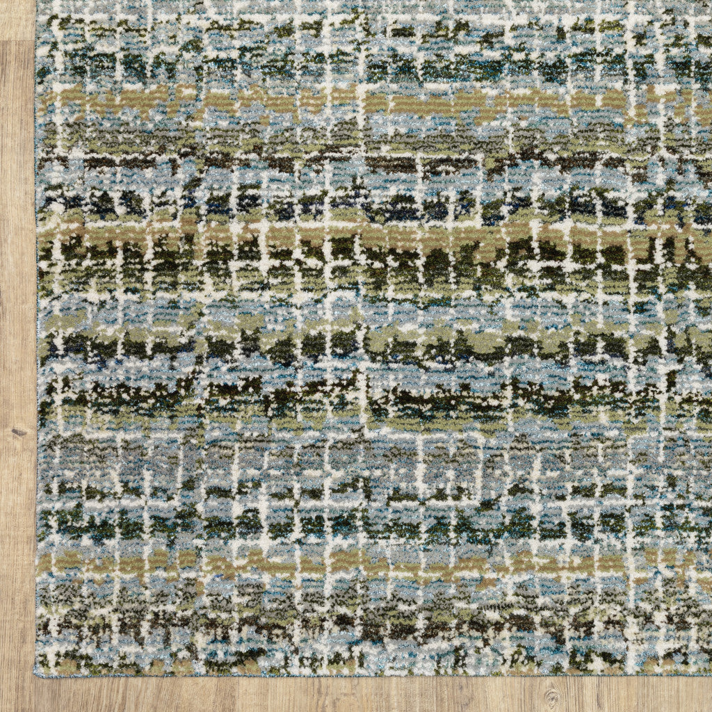 7' X 10' Blue and Ivory Abstract Power Loom Area Rug