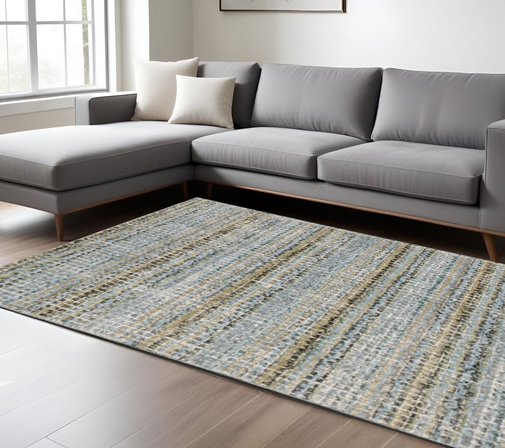 9' X 12' Blue and Ivory Abstract Power Loom Area Rug