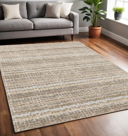 5' X 7' Gray and Ivory Abstract Power Loom Area Rug