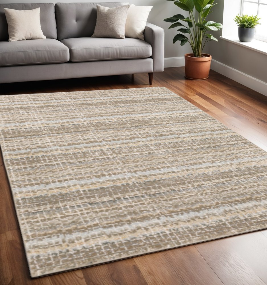 5' X 7' Gray and Ivory Abstract Power Loom Area Rug