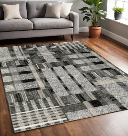 5' X 7' Gray and Black Geometric Power Loom Area Rug
