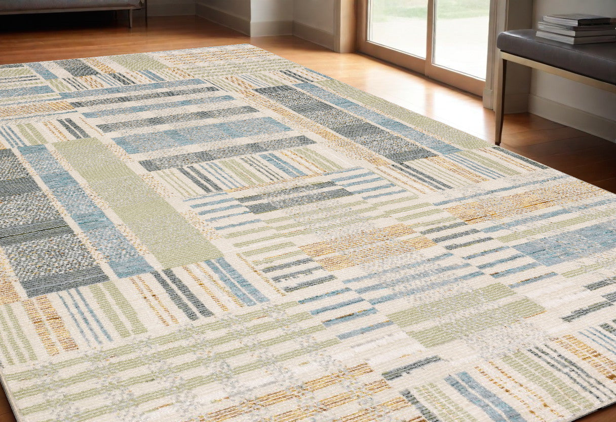 5' X 7' Gray and Ivory Geometric Power Loom Area Rug