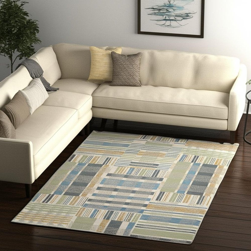 5' X 7' Gray and Ivory Geometric Power Loom Area Rug
