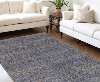 7' X 10' Blue and Ivory Power Loom Area Rug