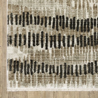 4' X 6' Beige Ivory Charcoal Brown Tan And Grey Abstract Power Loom Stain Resistant Area Rug With Fringe